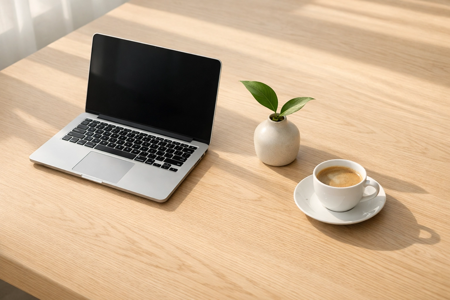 Minimalist workspace representing secure data migration to a new hotel PMS.