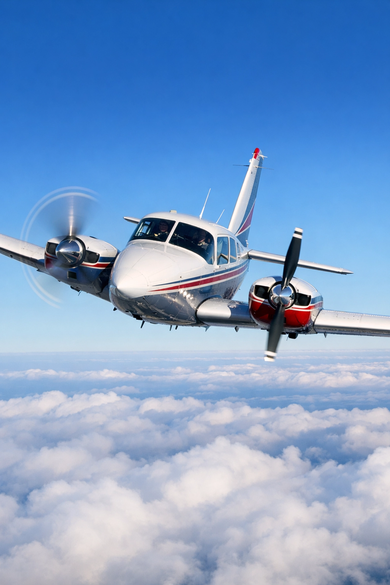 Twin Comanche aircraft demonstrating zero side slip with one engine feathered during multi-engine training.