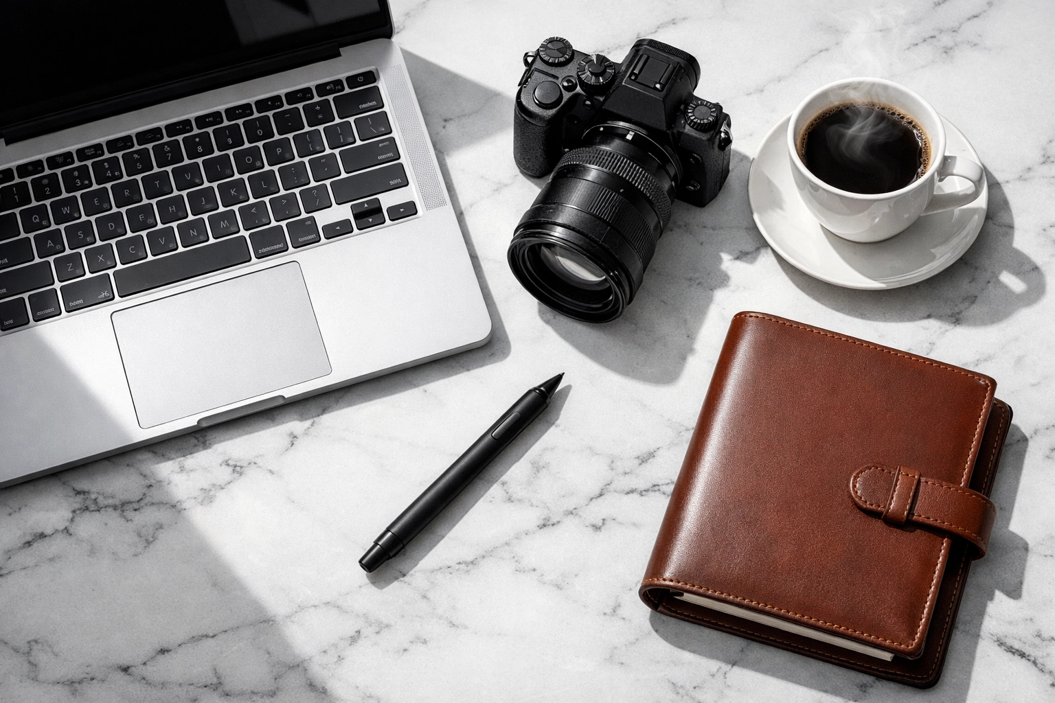 Modern office desk with digital tools and a planner representing school strategy execution.