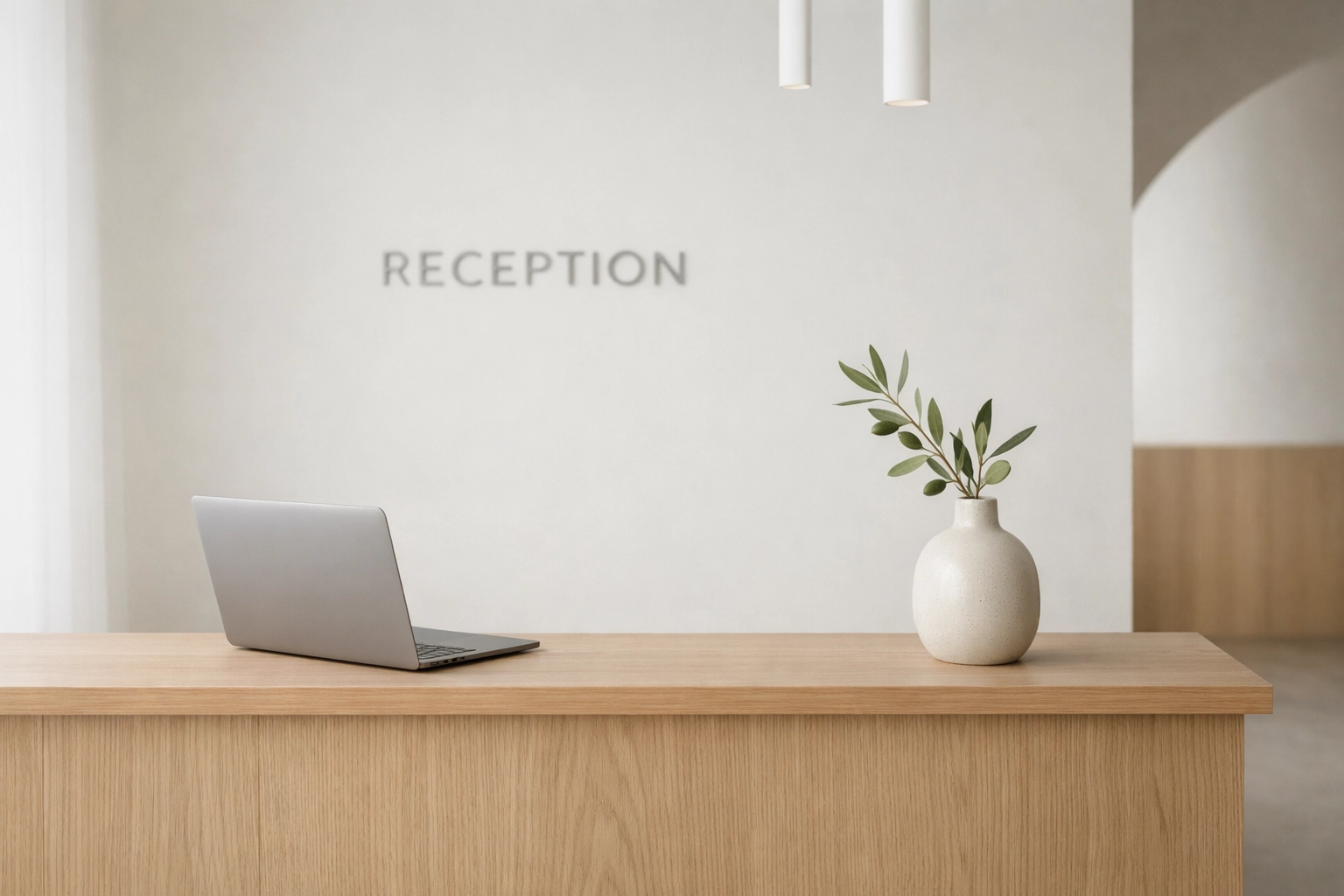 Minimalist boutique hotel reception area highlighting streamlined operational excellence.