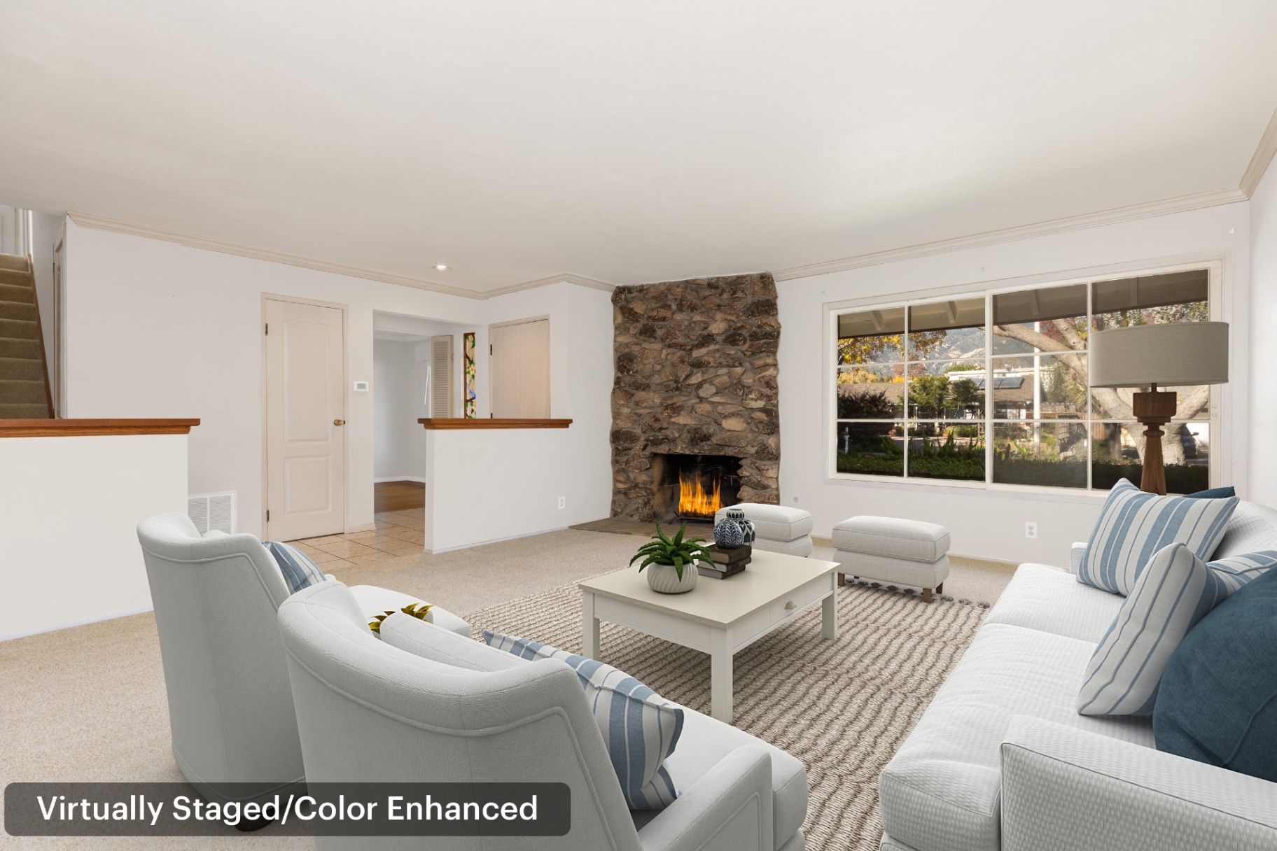 Living room (virtually staged) with fireplace—ideal for everyday gathering