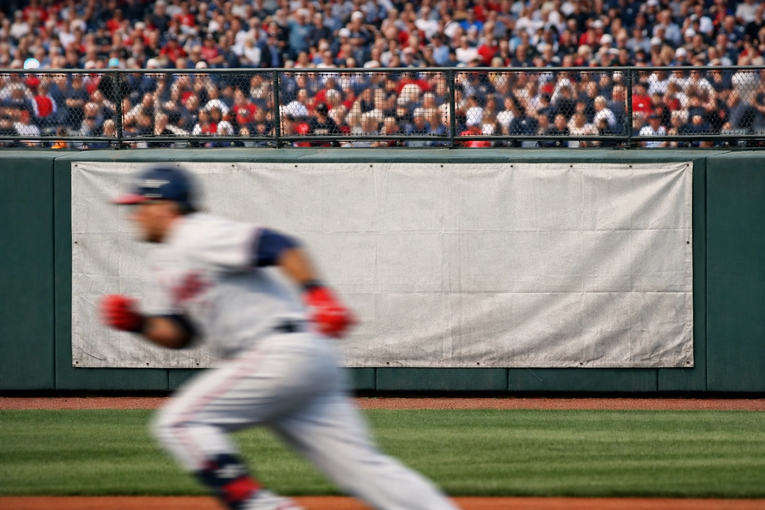 Traditional static stadium advertisement banner on a baseball outfield wall showing outdated physical signage.
