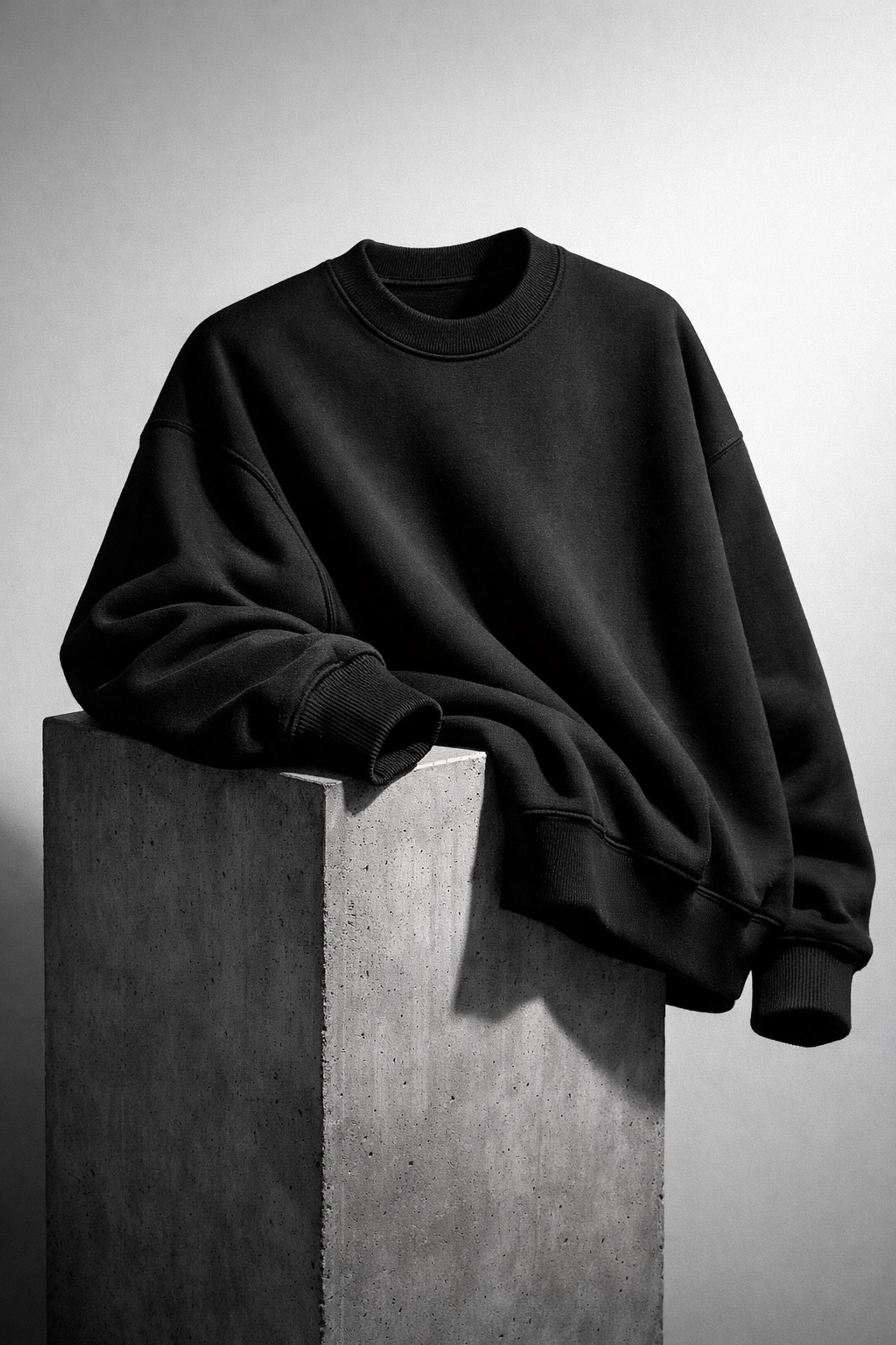 PWPTAOS black oversized sweatshirt showcasing premium 10 oz Airlume cotton fleece and durable construction.