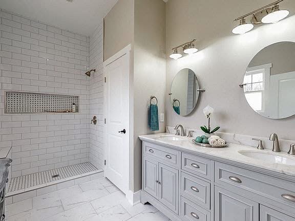 Modern Bathroom Remodel featuring walk-in shower and double vanity