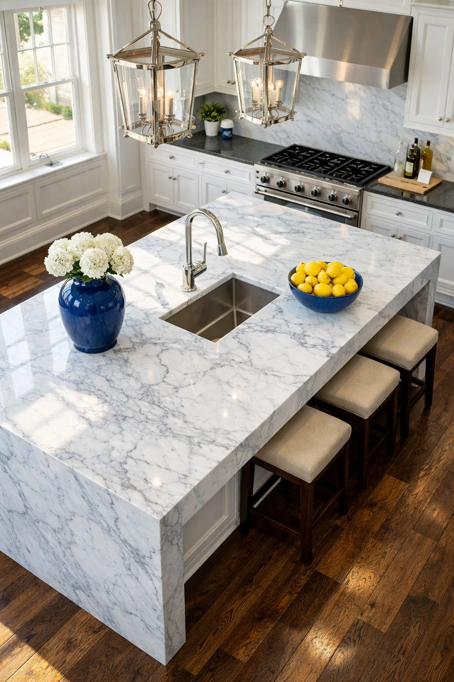 Professional deep cleaning Wellesley MA results on a luxury marble kitchen island and dark wood floors.