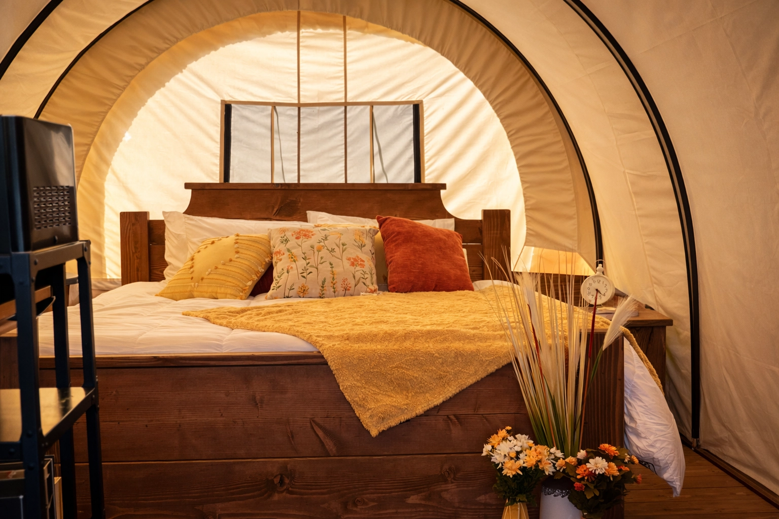 King bed inside our Conestoga wagon (real photo from Sunset Hills)