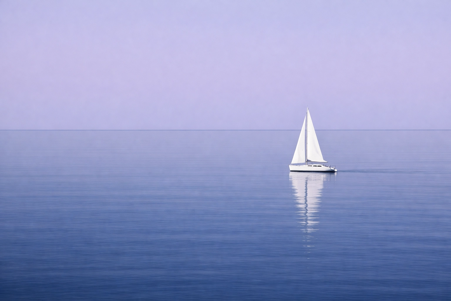 A minimalist sailboat on a calm sea representing business clarity and sustainable entrepreneurial growth.