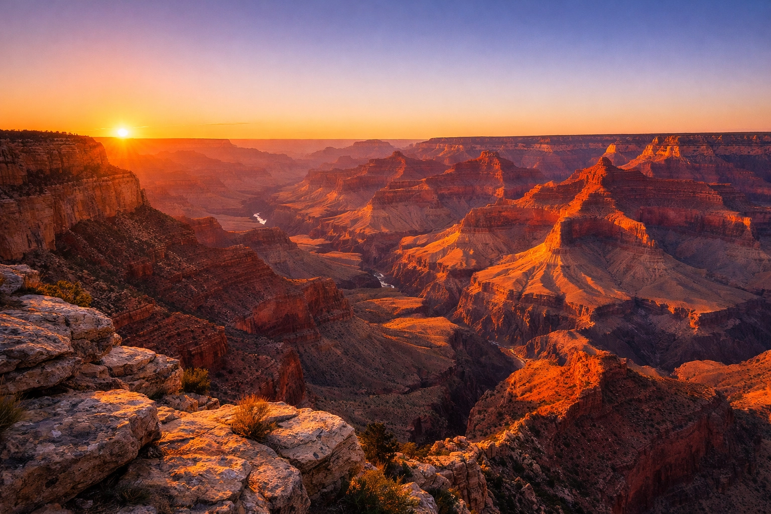 Stunning Grand Canyon sunset from a rim overlook, one of the best photography locations in the Americas.