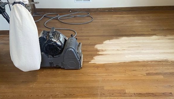 Professional Floor Sander in Use