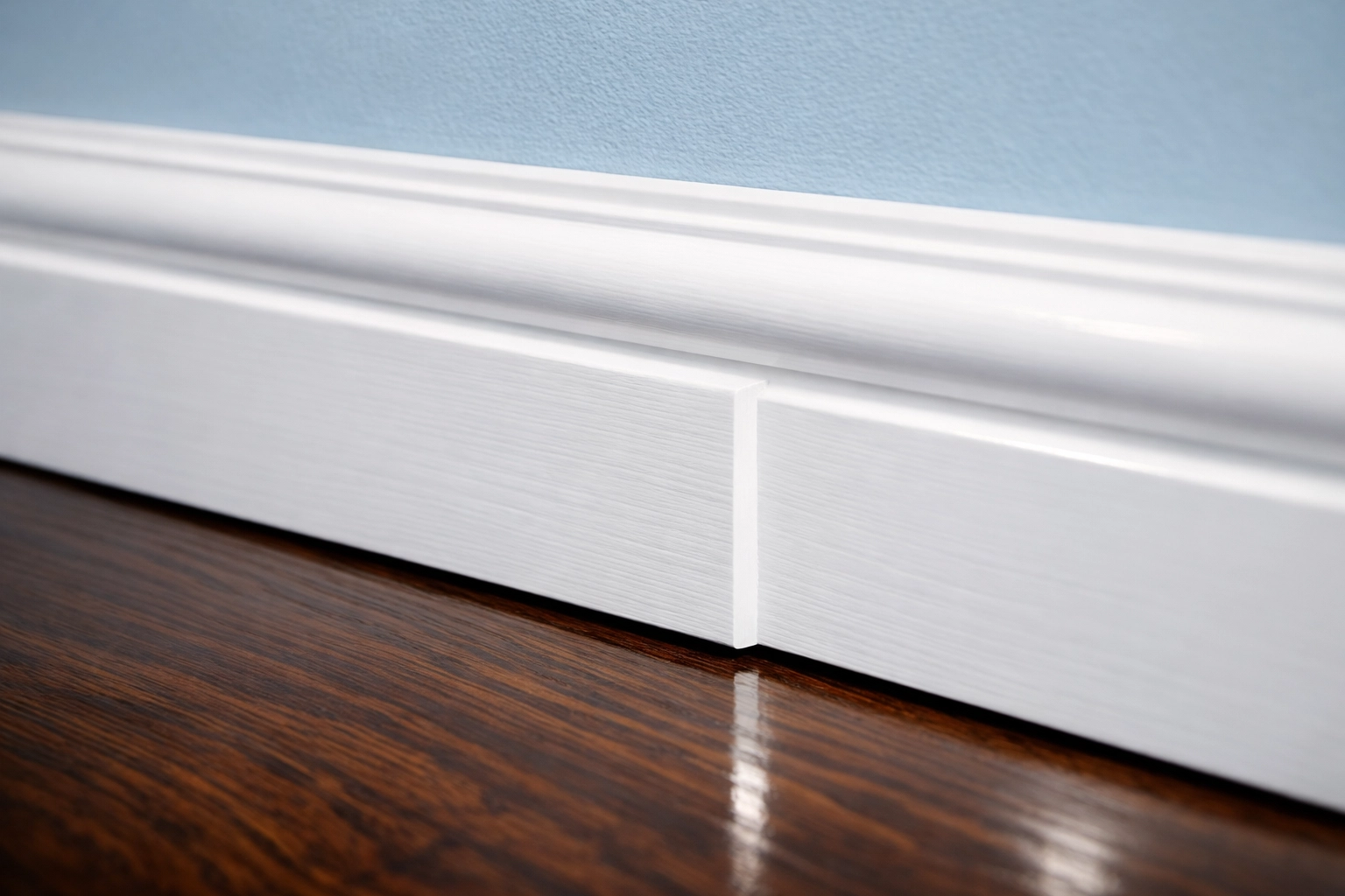 Macro view of clean baseboards demonstrating professional deep cleaning in Massachusetts.