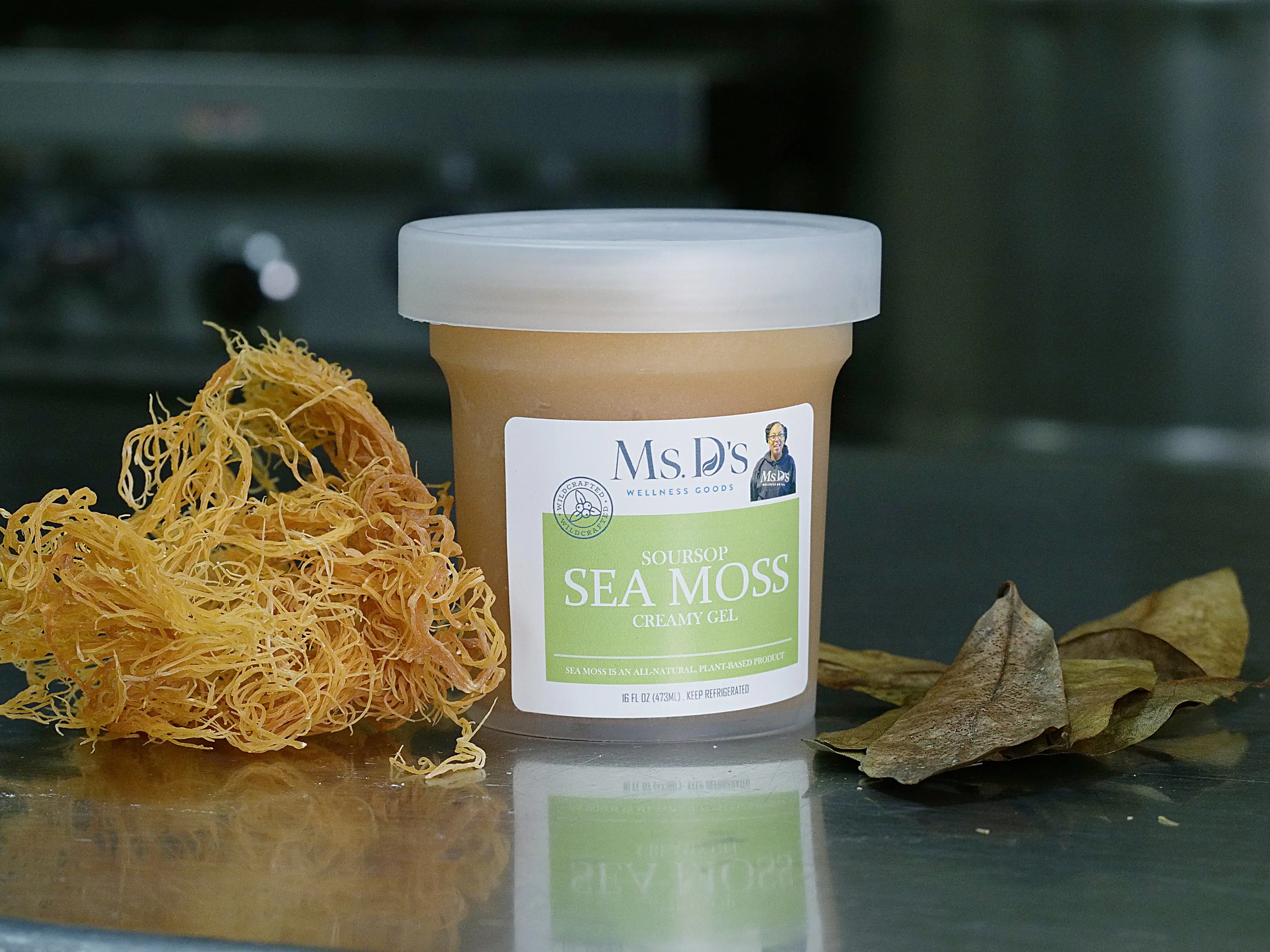Soursop Sea Moss Creamy Gel jar on a stainless surface