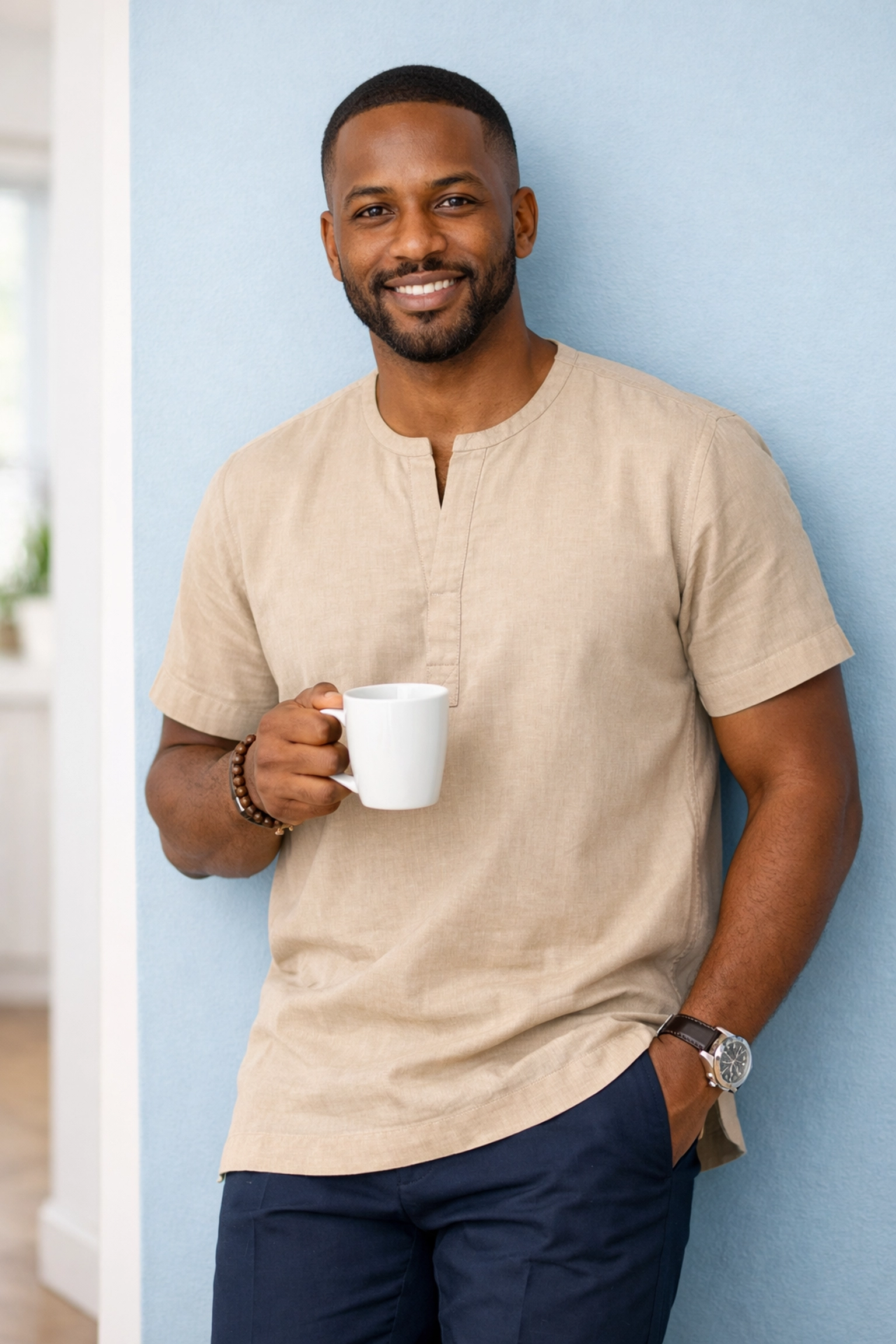 Casual men's kaftan styled with trousers for modern everyday wear