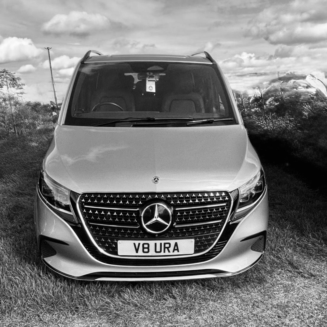 Front view of a luxury silver Mercedes-Benz V-Class with “V8 URA” personalised registration plate