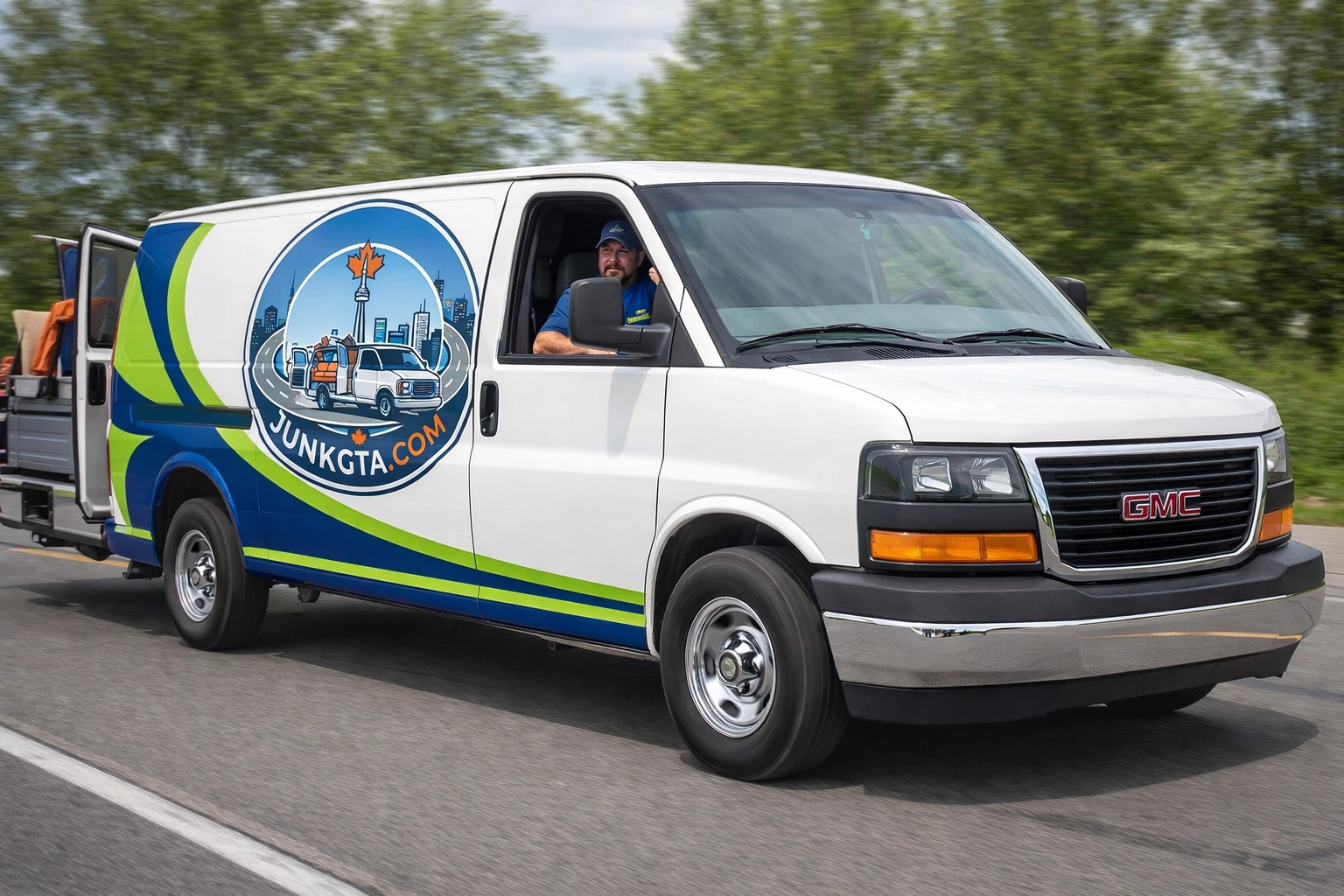 Basement Cleanout Toronto: Reclaim Your Living Space Branded cargo van against Toronto skyline