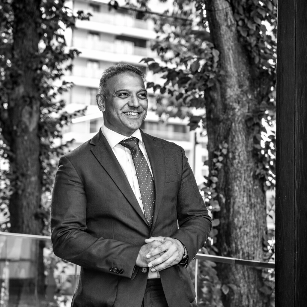 Author photo placeholder - add Mustafa Khan headshot here