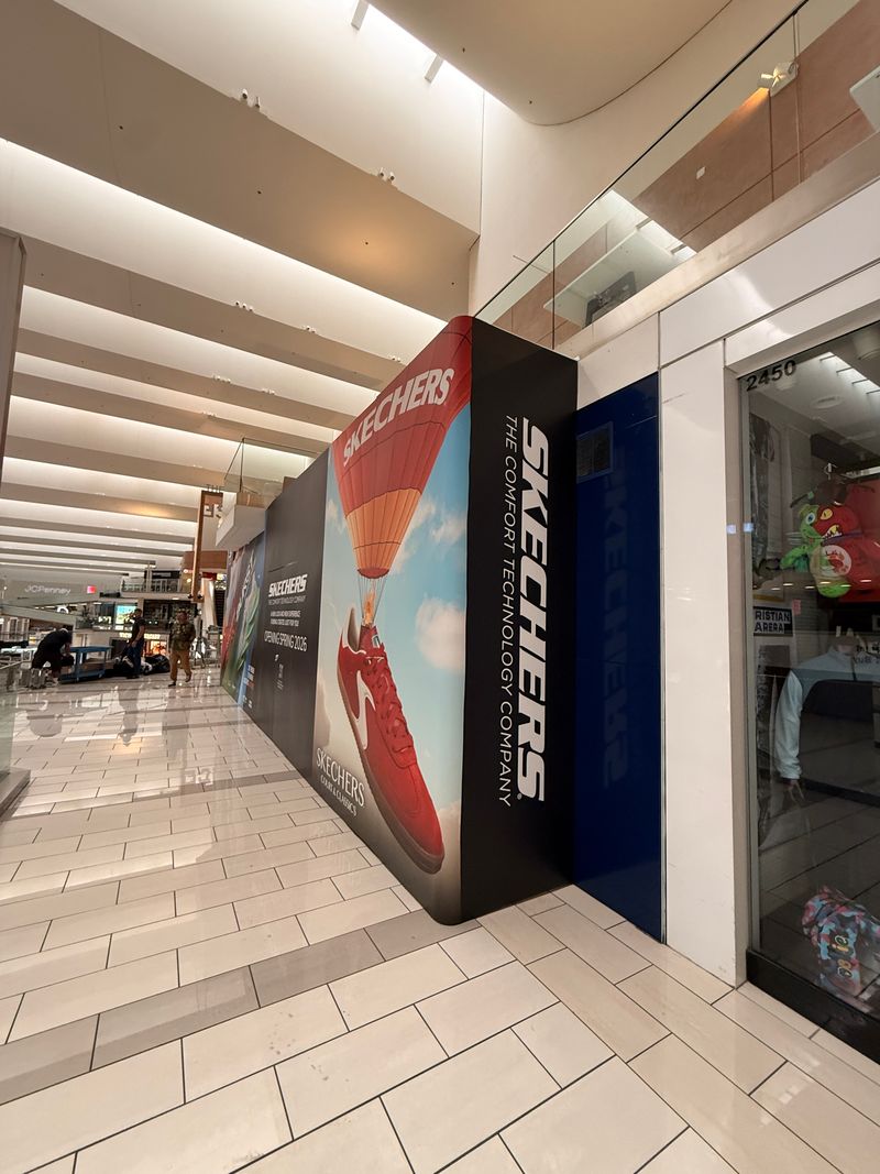 Large-format retail barricade graphics for Skechers