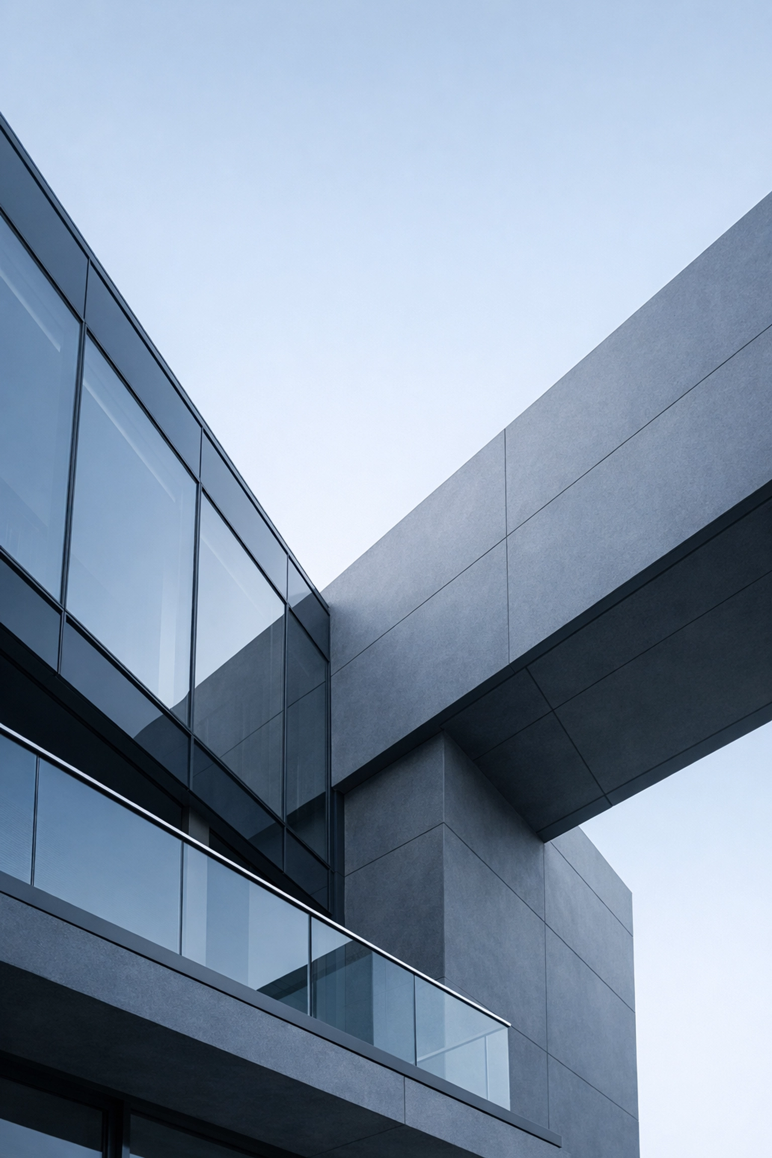 Modern hotel architecture with clean lines, representing the transparency and speed of a direct booking engine.