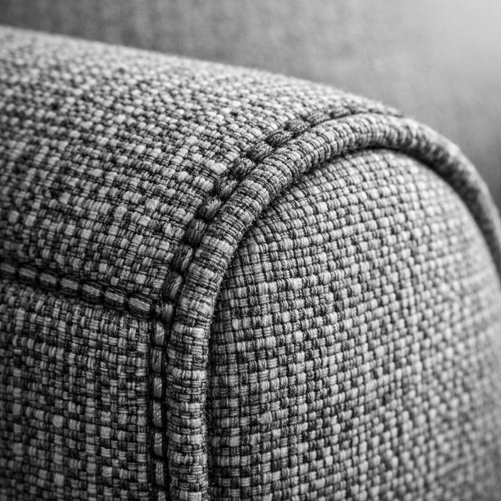 Close-up of durable, high-quality upholstery fabric used for long-lasting residential sofa restoration.