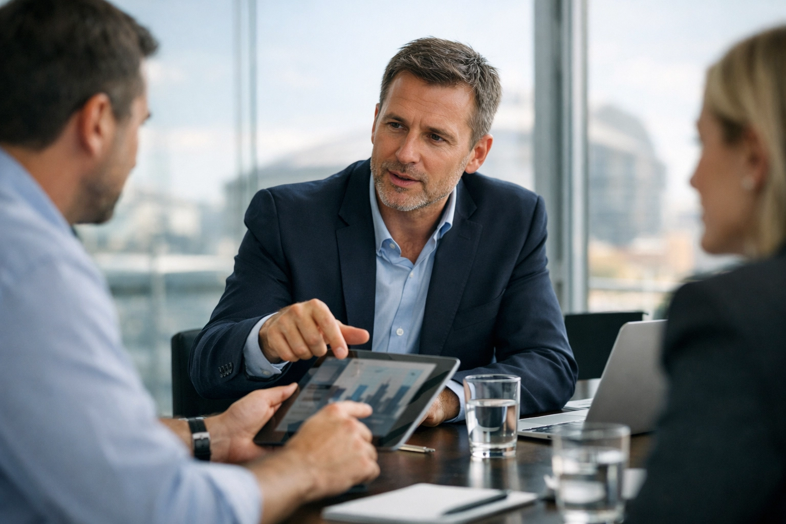 Consultants discussing ServiceNow implementation ROI and EU DORA compliance in a professional setting.