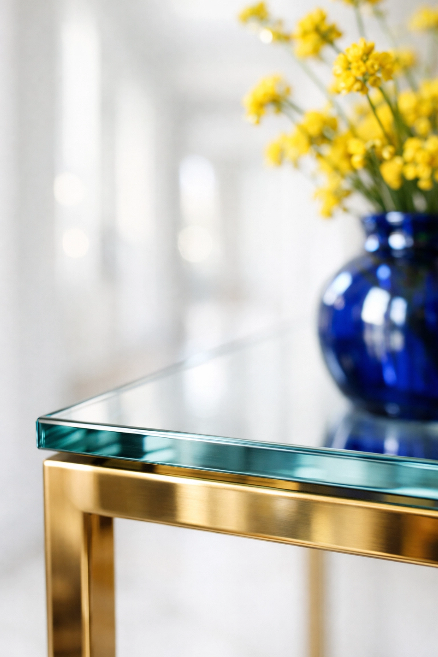Detailed view of a dust-free glass table and flowers in a healthy Lincoln home environment.