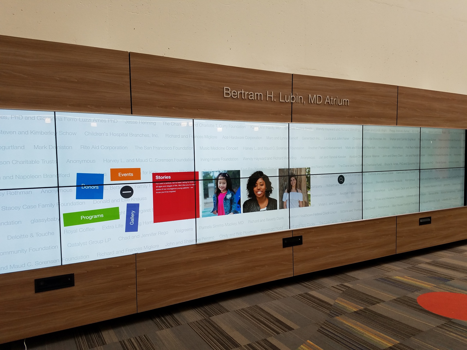 Wall-mounted interactive digital donor recognition display