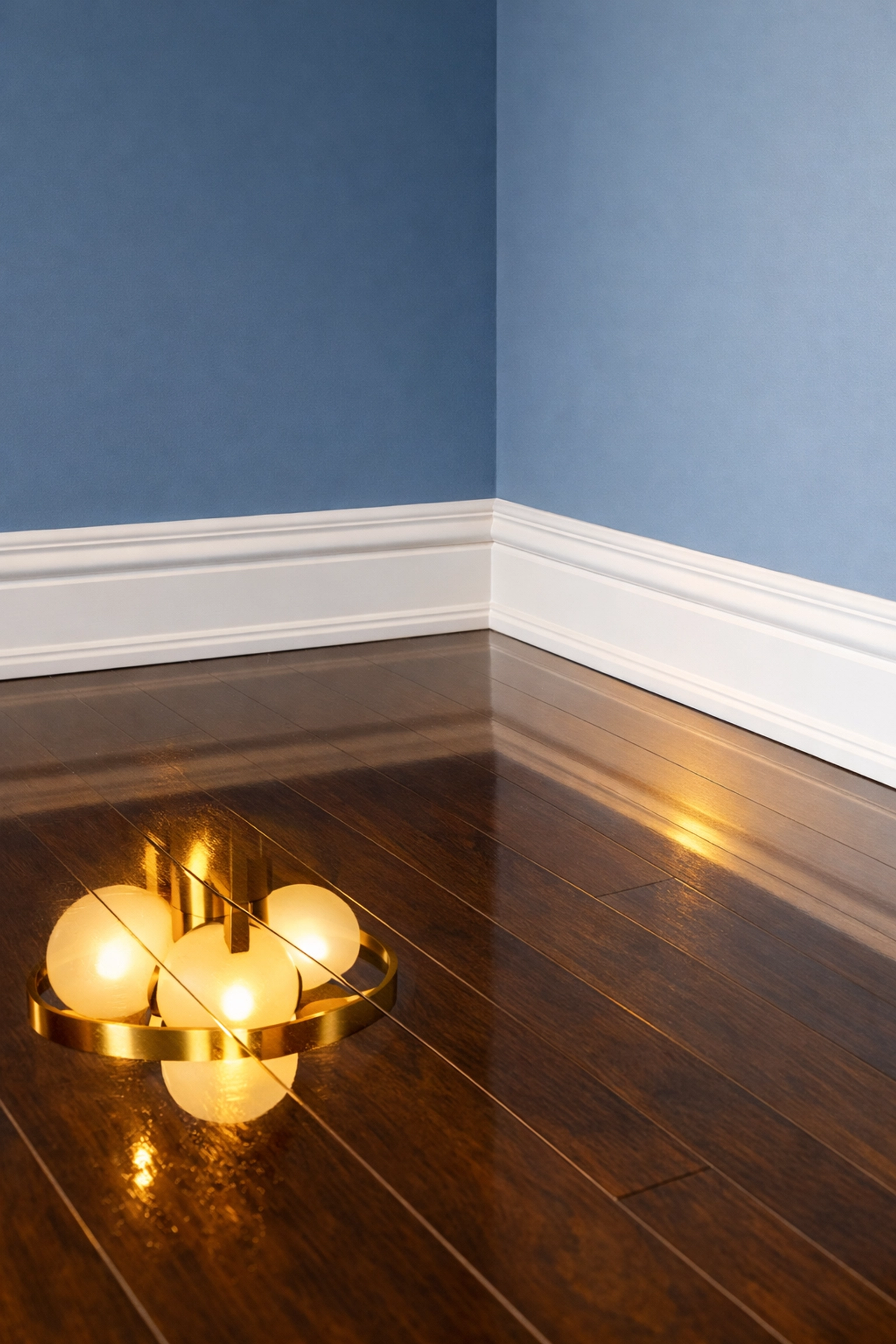Pristine white baseboards and polished hardwood floors in an empty Bolton home after professional cleaning.