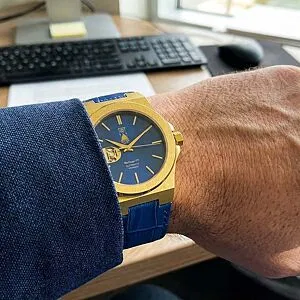 blue-dial-watch-at-desk-time-is-discipline.webp