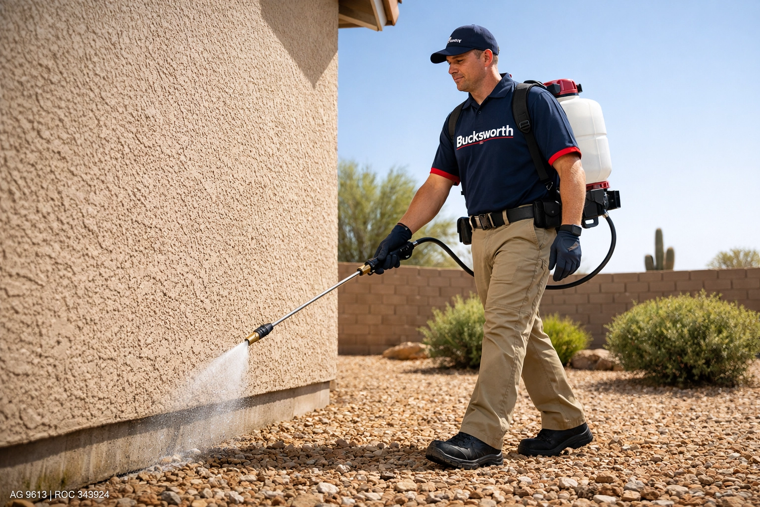 Bucksworth technician applying a liquid perimeter for scorpion protection in Glendale, AZ.