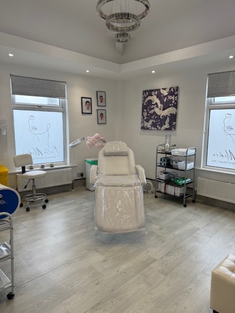 Bright, modern treatment room at Bella Medica Aesthetics