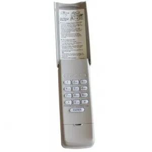 Universal garage door keypad with flip-up protective cover