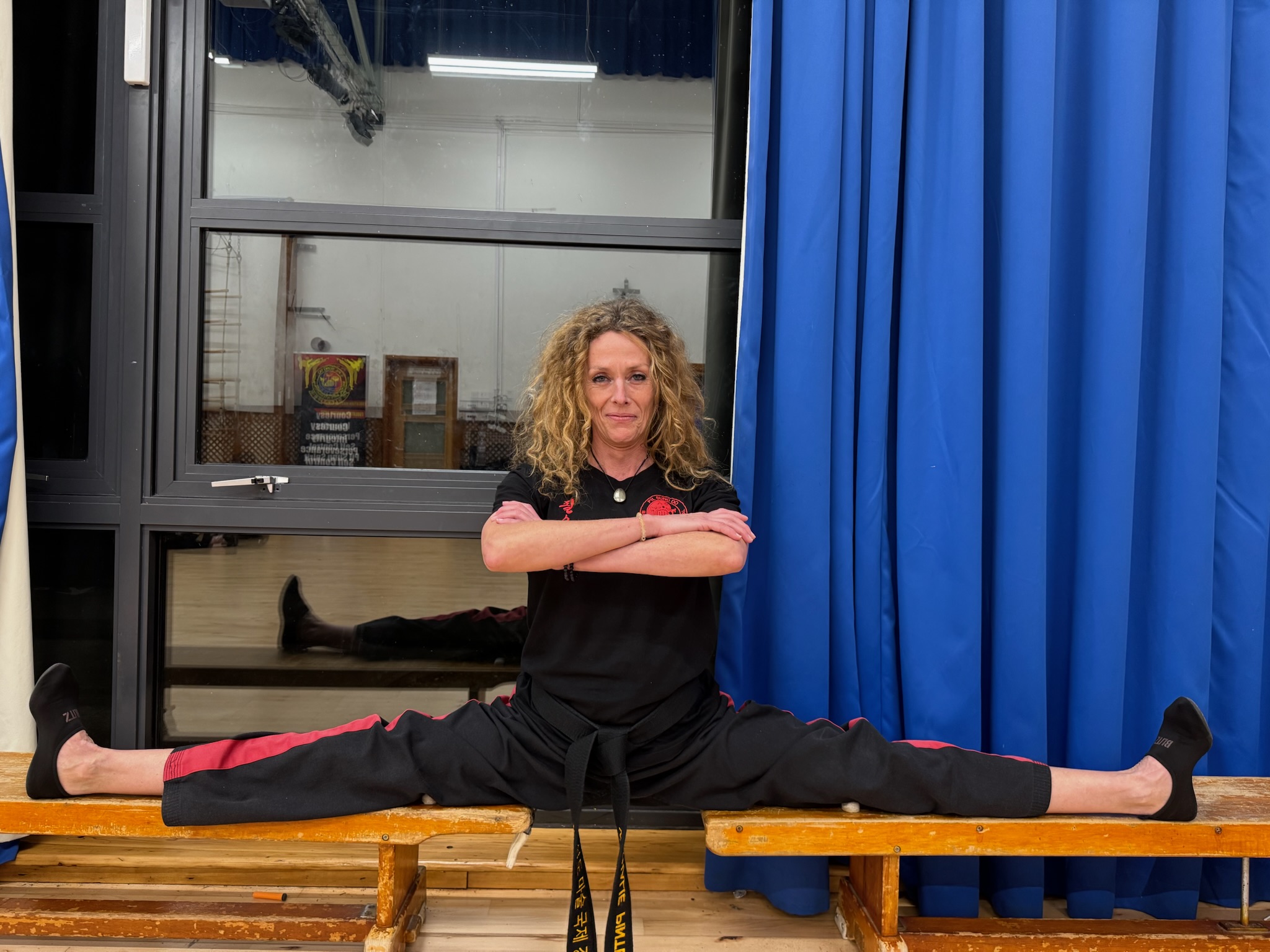 Adult Female Martial Arts Instructor Performing Full Split