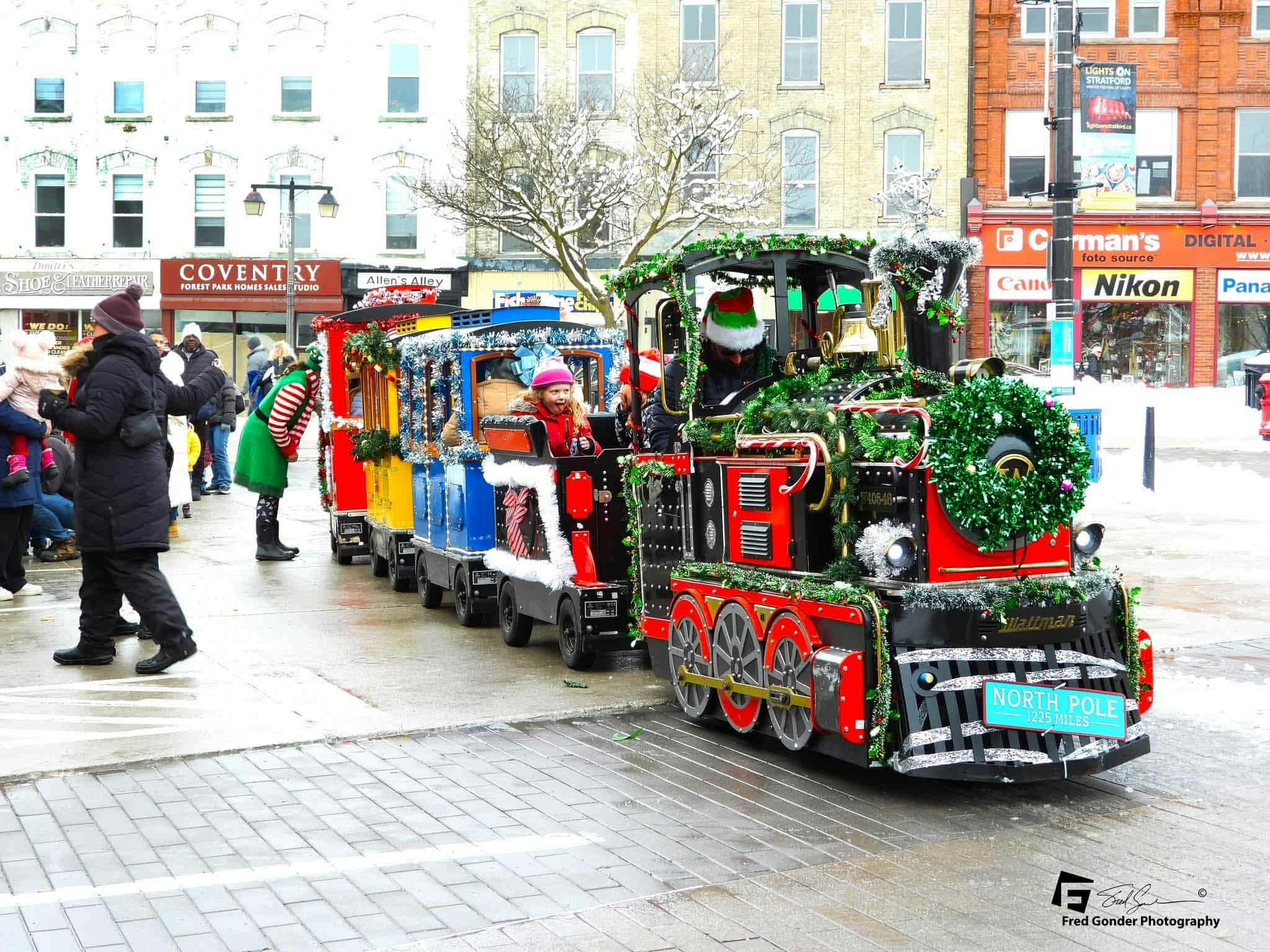 Trackless holiday train at winter downtown event