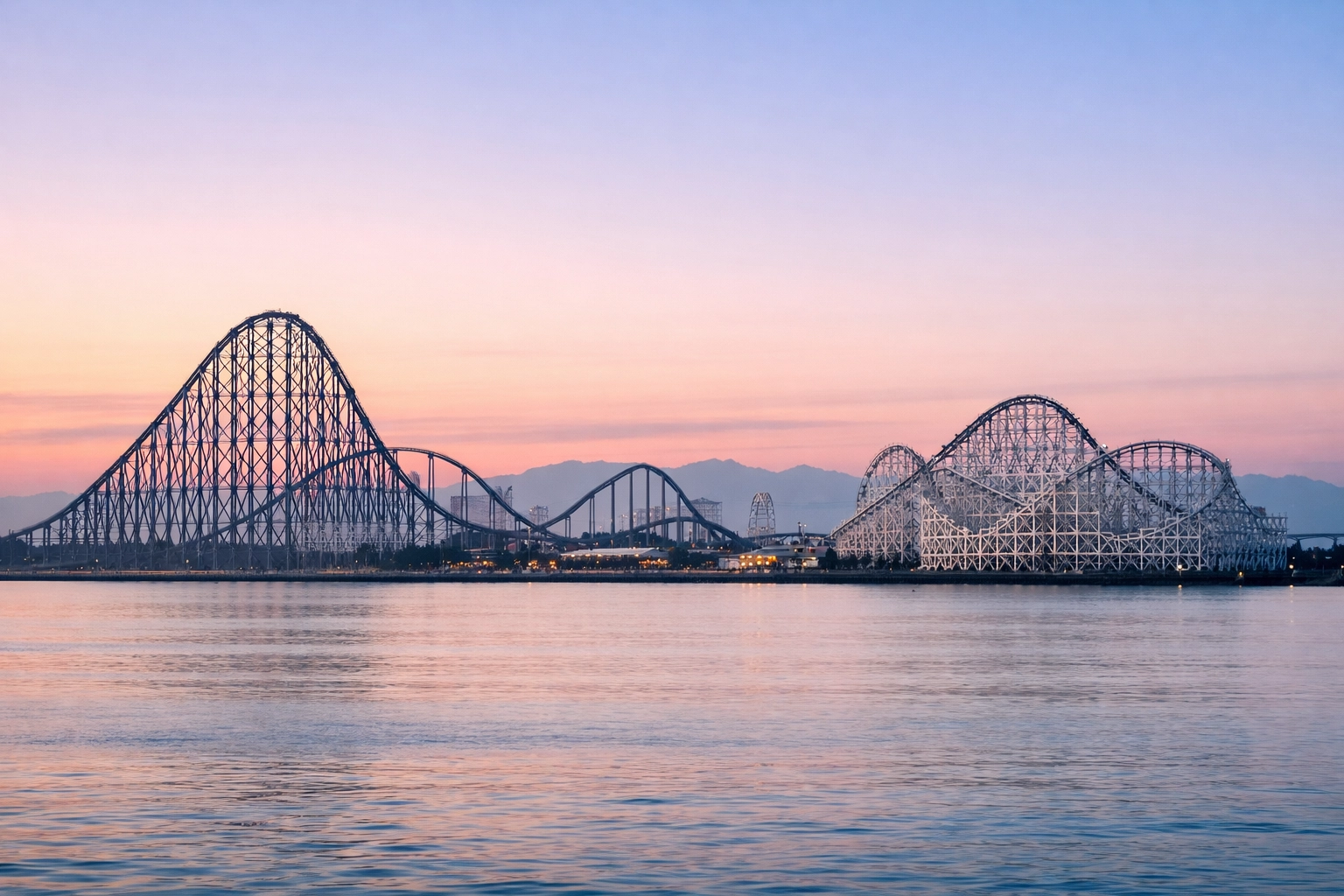 Wide landscape of Nagashima Spa Land coasters at sunrise, one of the best photography locations in Japan.