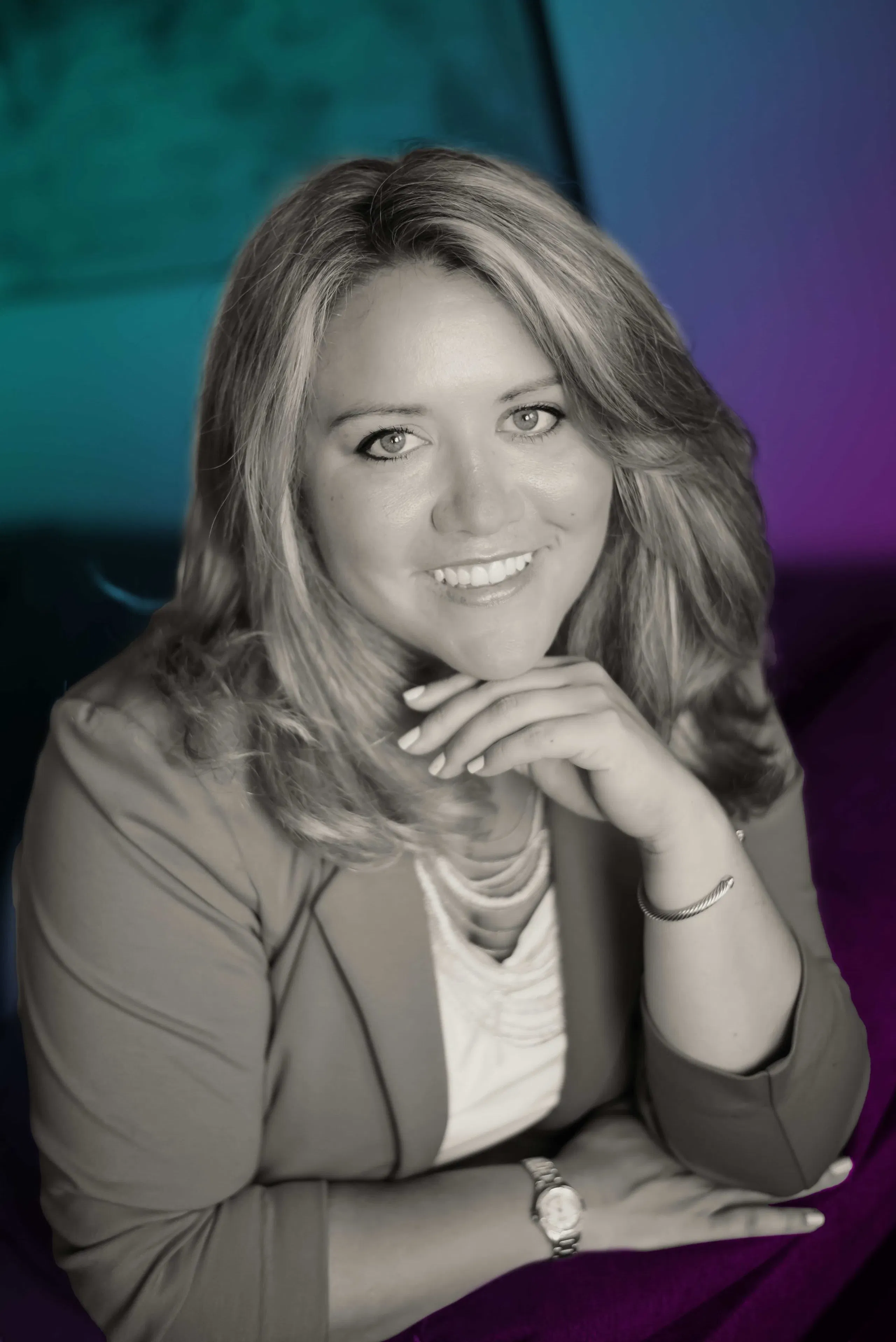 Professional woman seated and smiling, representing Nepatech Solutions’ human-centered approach