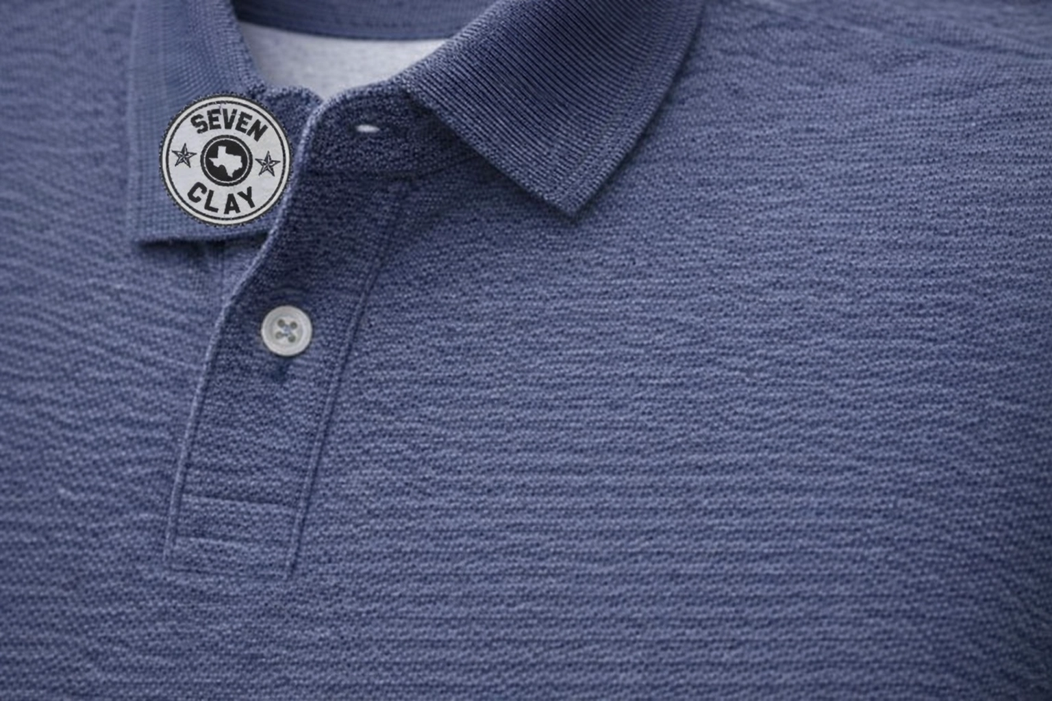 Close-up of professional screen printing on quality polo shirt with vibrant colors