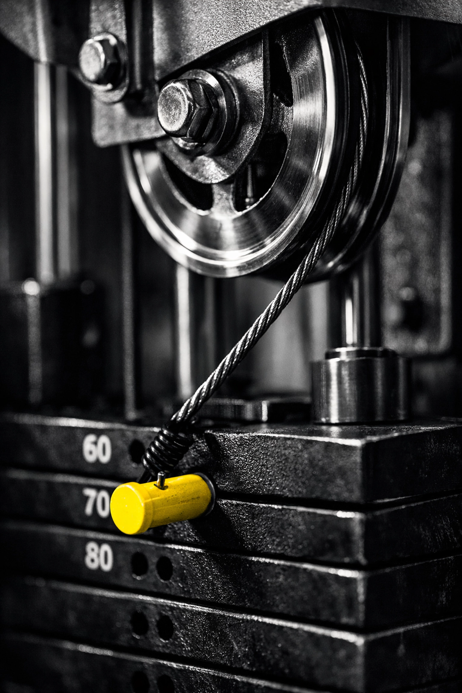 Close-up of gym machinery representing the systematic approach of a fitness marketing consultant.