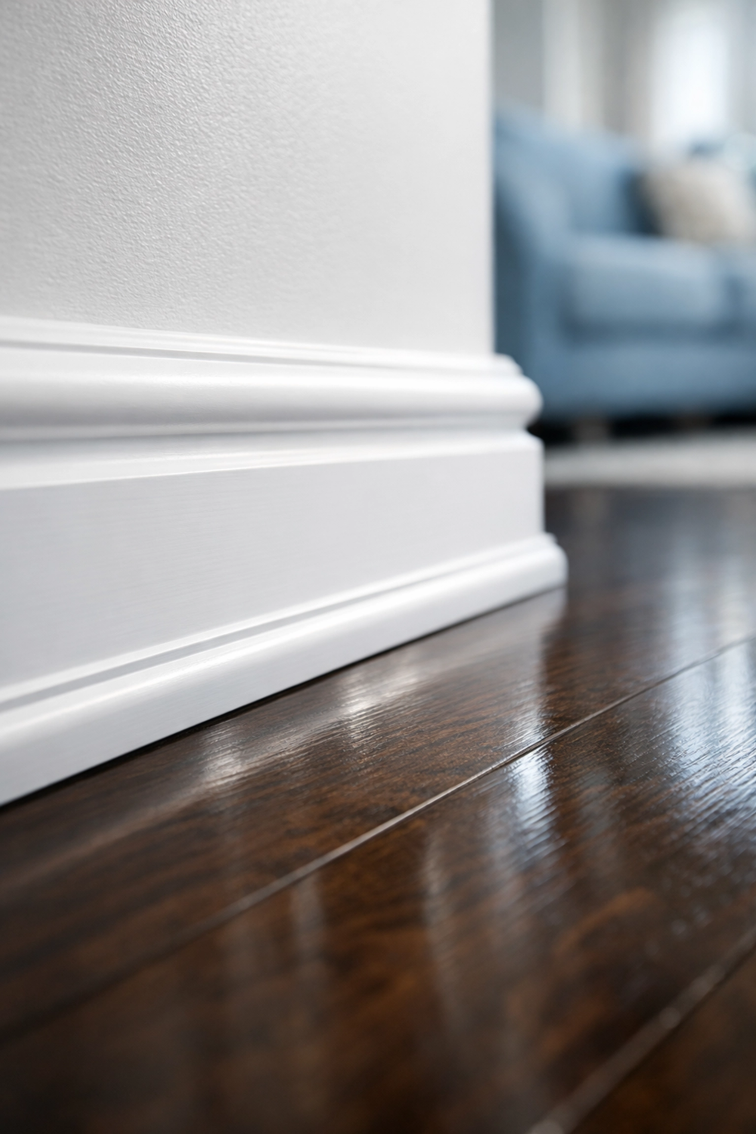 Detailed view of clean baseboards and polished floors in a Stow apartment after a deep move-out clean.