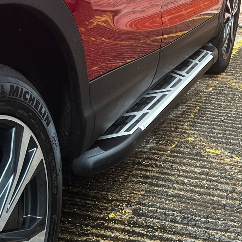 Side steps fitted to red SUV