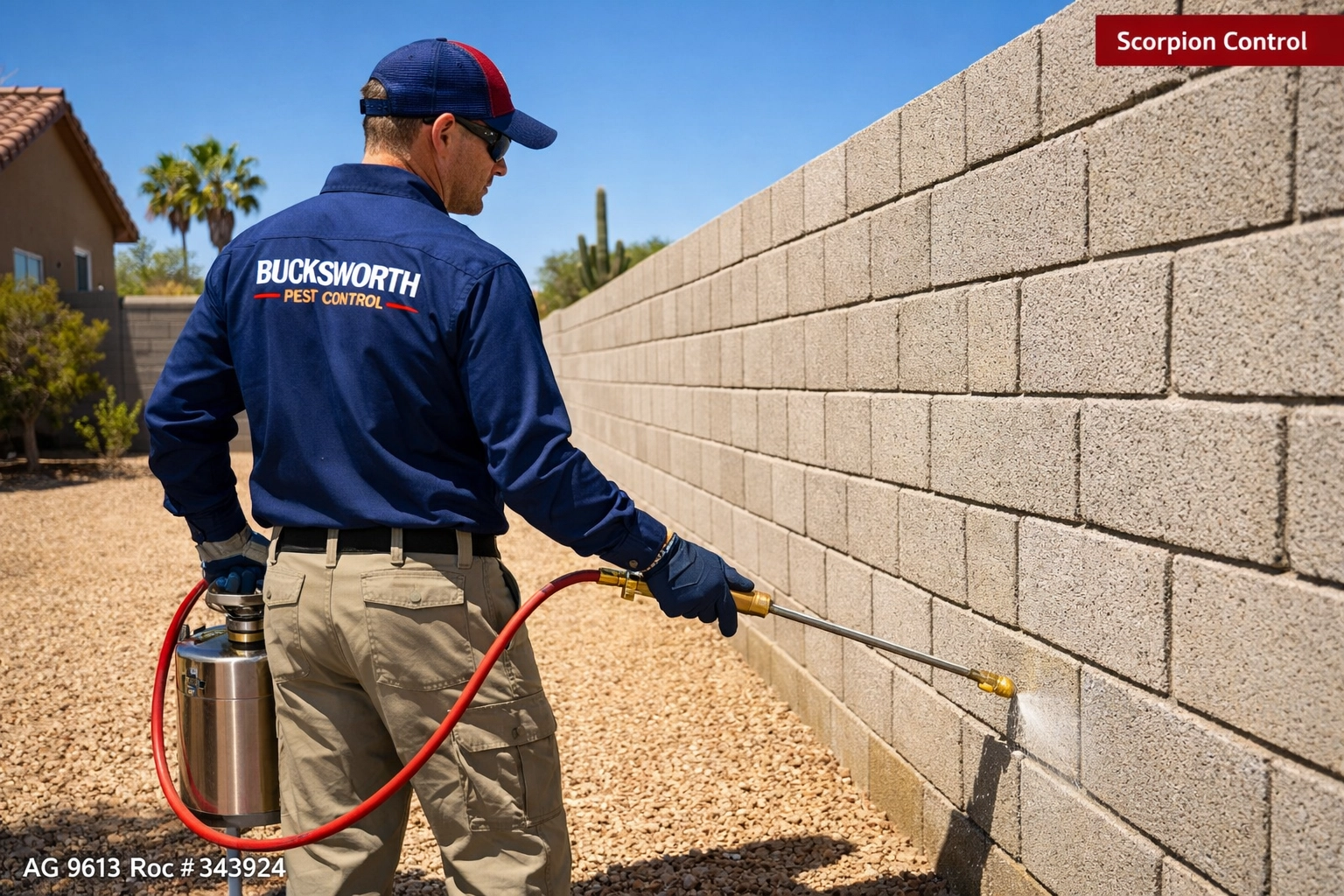 A Bucksworth technician performs block wall scorpion defense at a home in Gold Canyon, AZ.