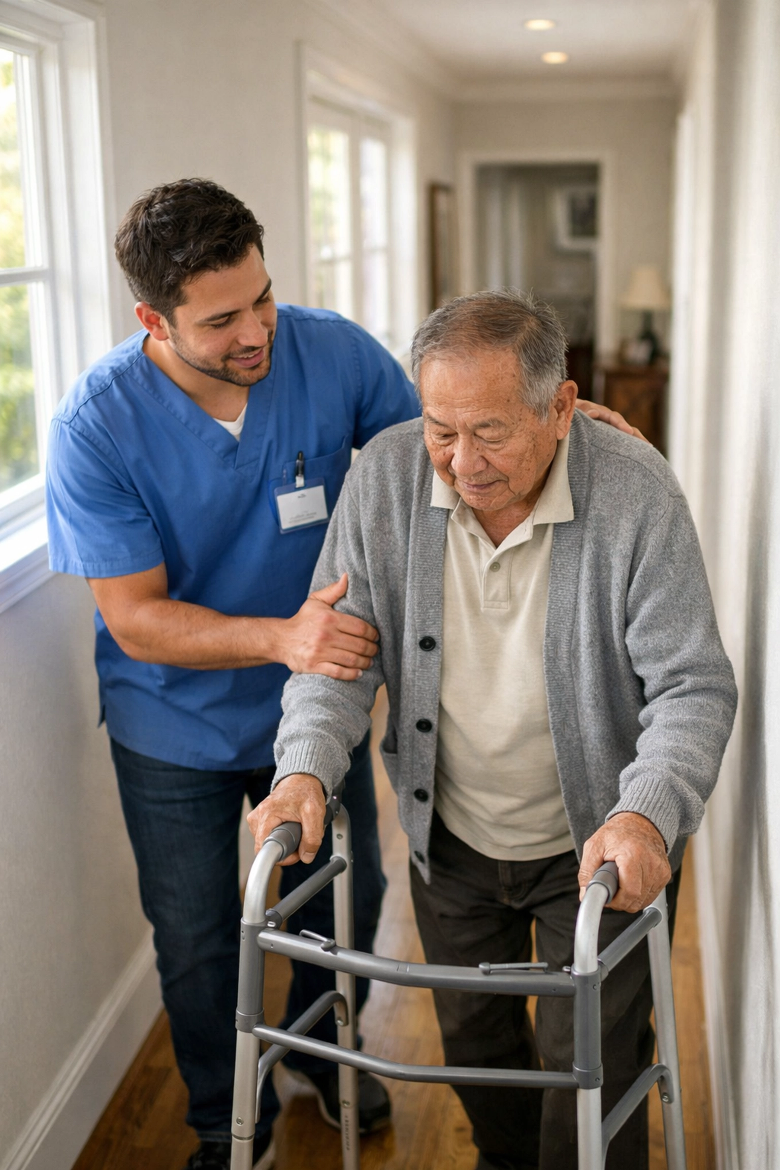 Home care professional helping senior with mobility assistance and daily living support