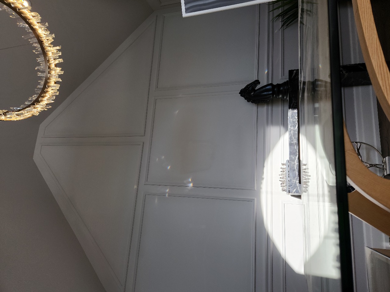 Real LDS Reno project: Custom panel molding accent wall with geometric gable design