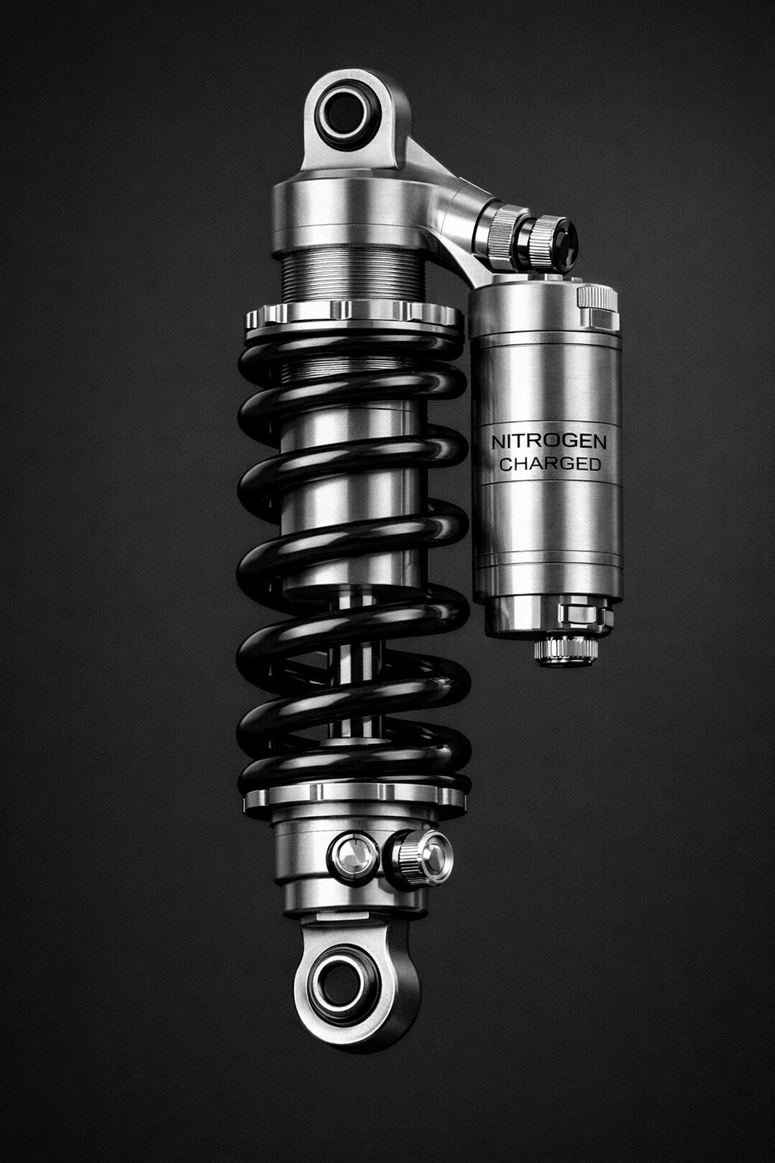 Premium nitrogen-charged reservoir shock absorber used in professional off-road customization builds.