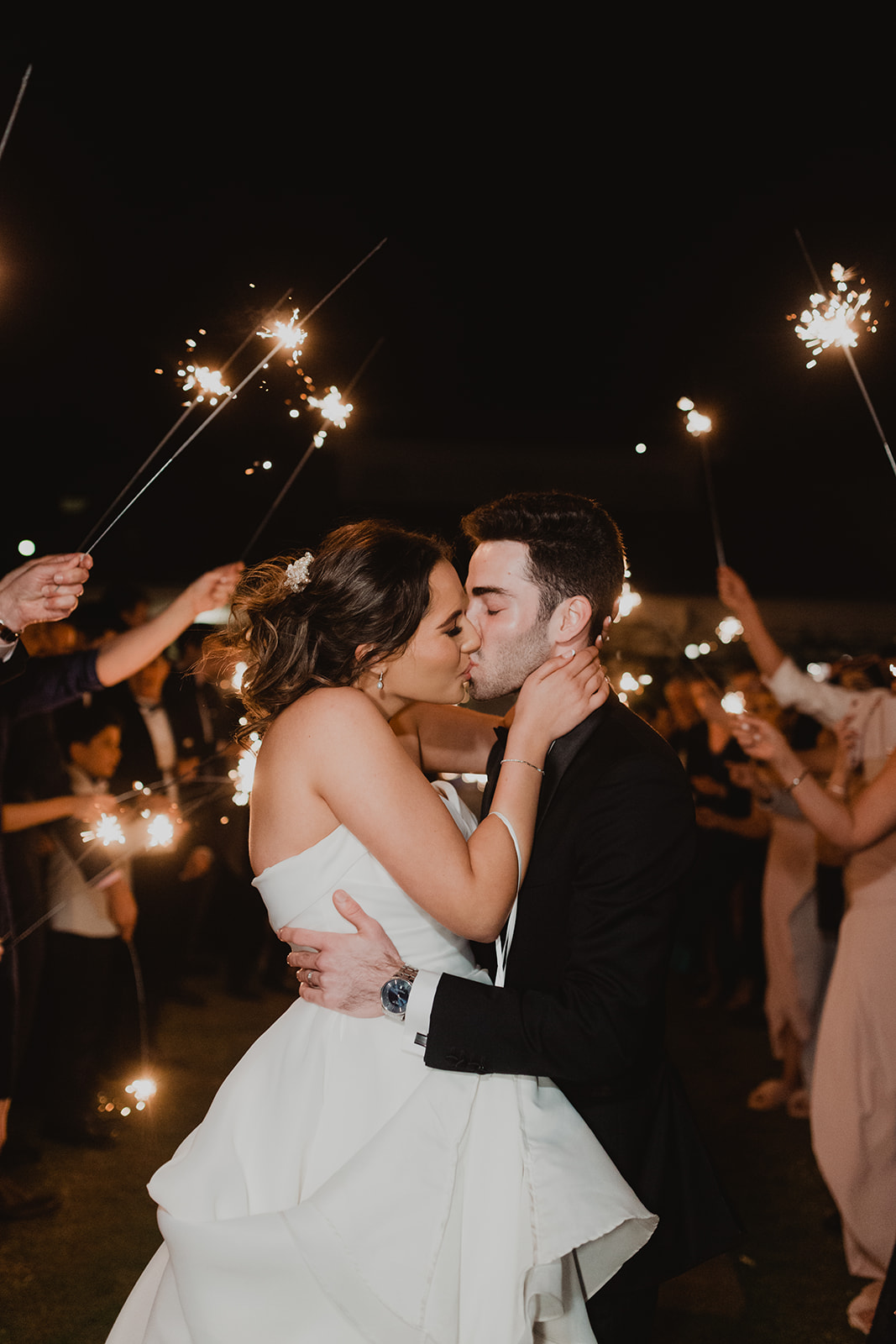 Bride and Groom Kiss at Outdoor Wedding