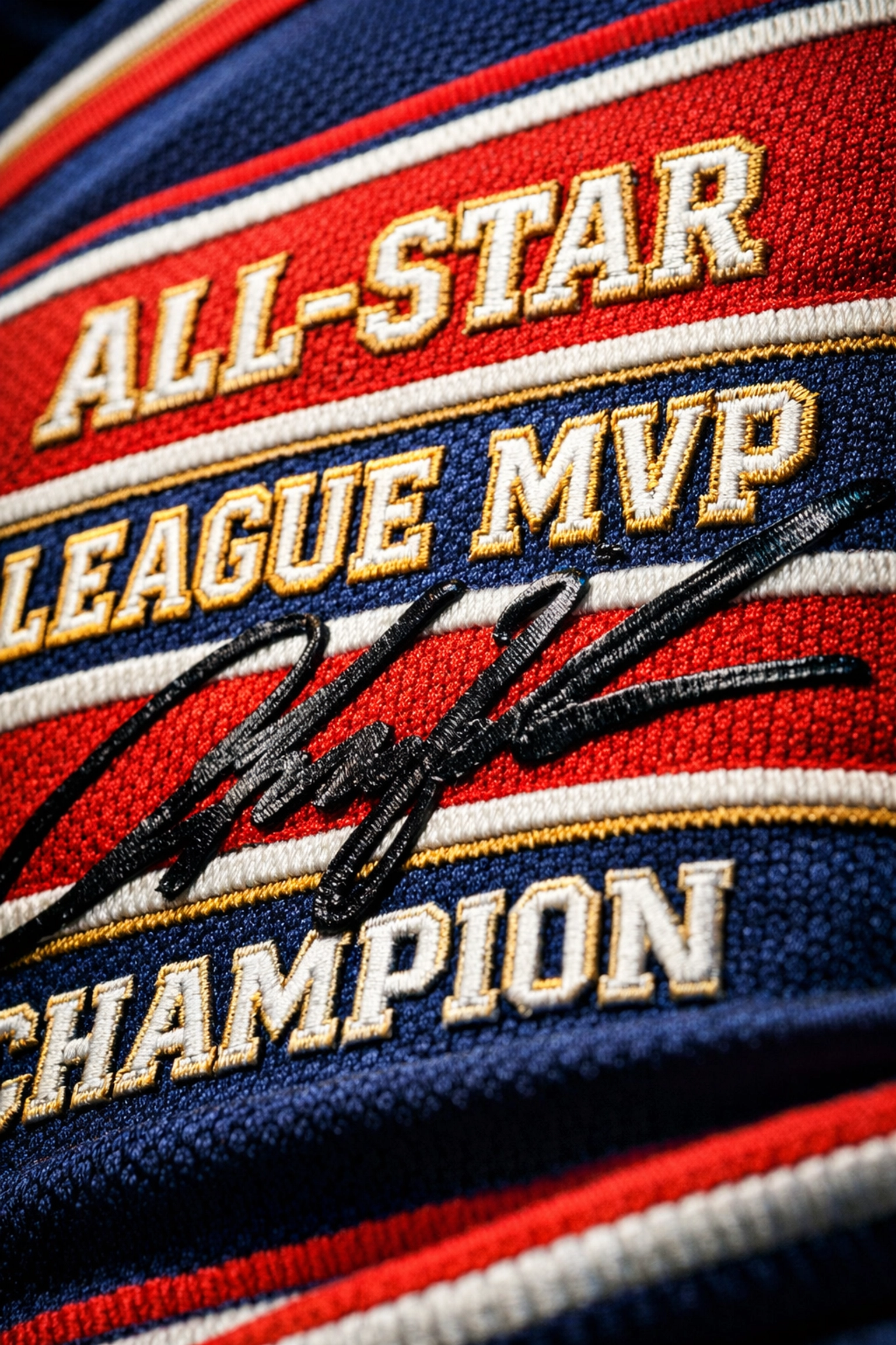 Close-up of an authentic signed career jersey with embroidered athlete milestones.