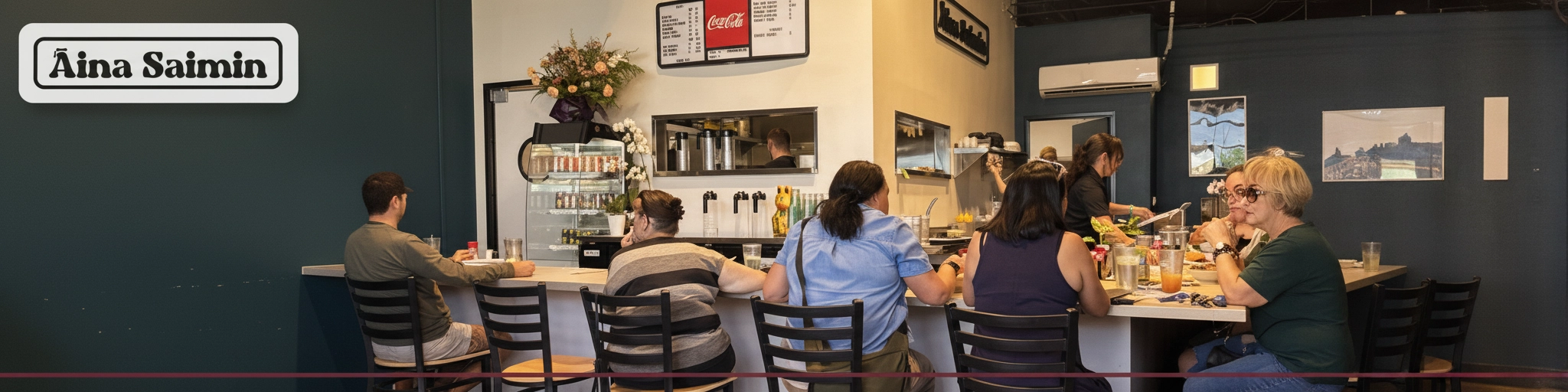Aina Saimin hero banner with logo over diner counter