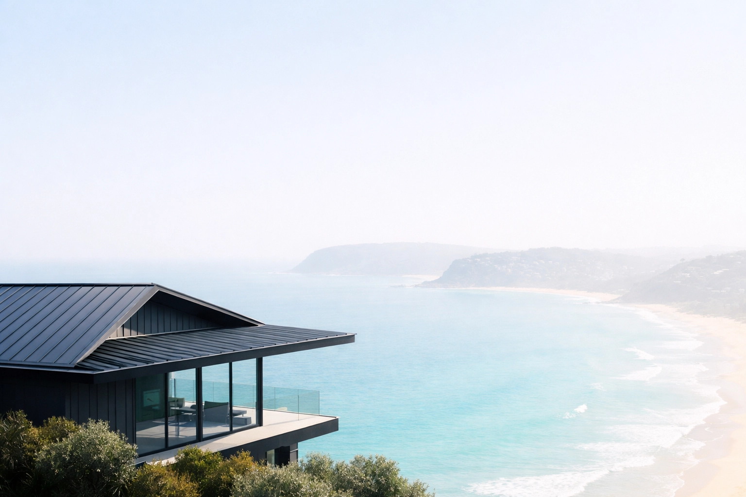 Coastal home with durable metal roofing overlooking the Northern Beaches ocean scenery.