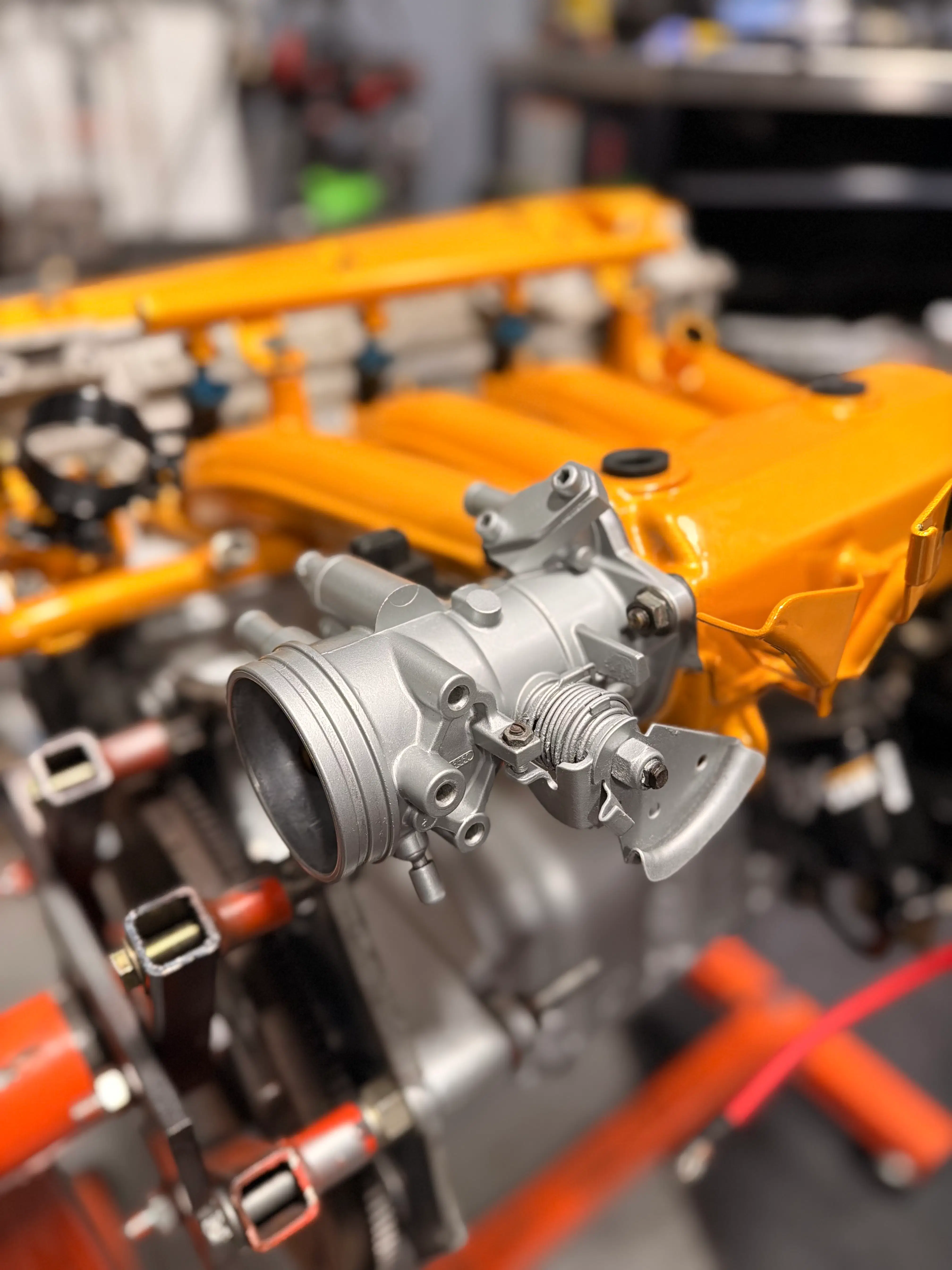 Vibrant Orange powder coated engine intake and valve cover