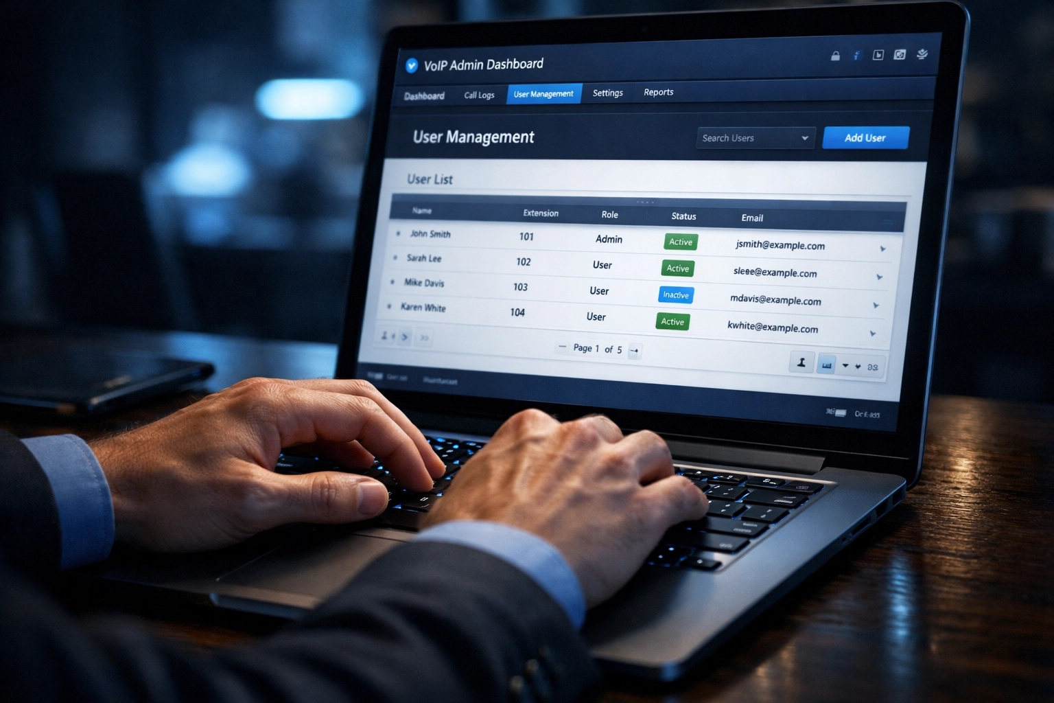 Business owner managing VoIP phone system through cloud administration dashboard