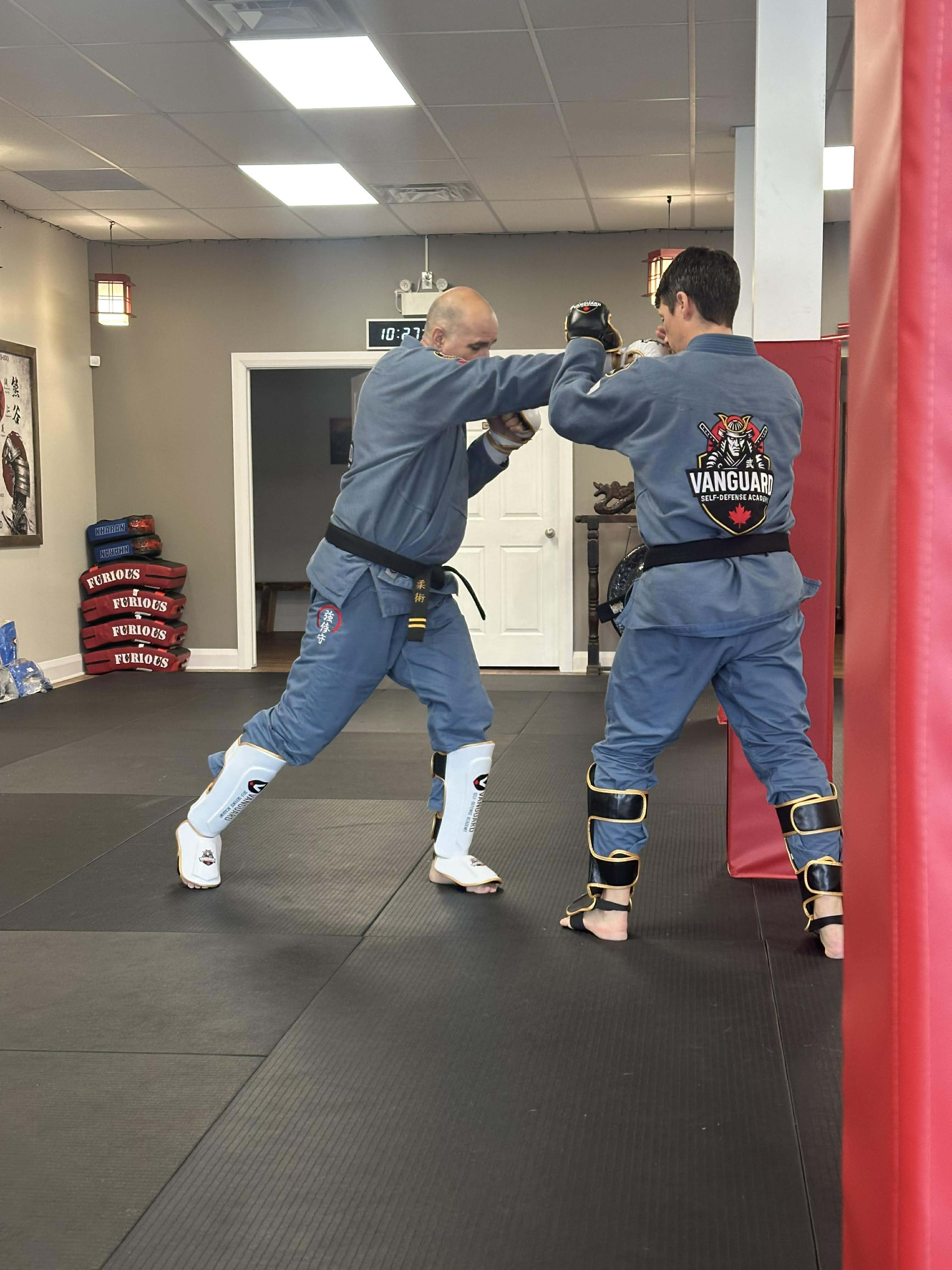 Adult MMA Partner Drill at Vanguard Self-Defense Academy