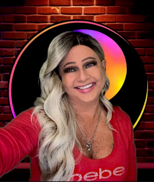 Maddie 10 She wears a red top with the word “bebe” and layered necklaces.